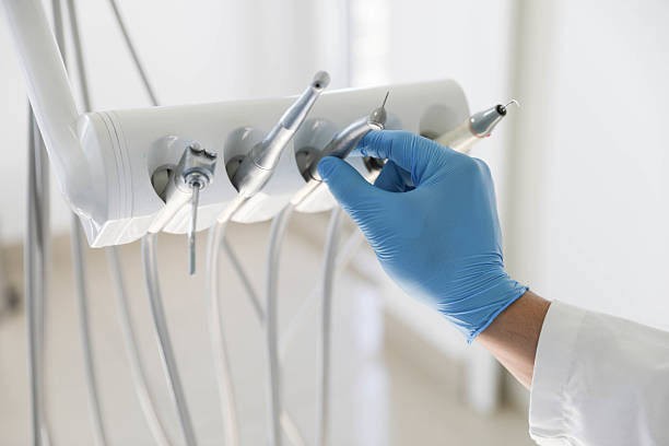 Professional Tooth Extraction technician working in El Reno, OK